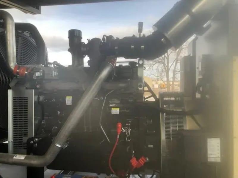A close up of a generator engine.
