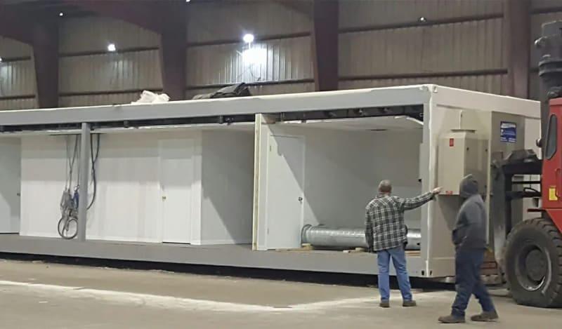 The interior of a module building with two rooms.