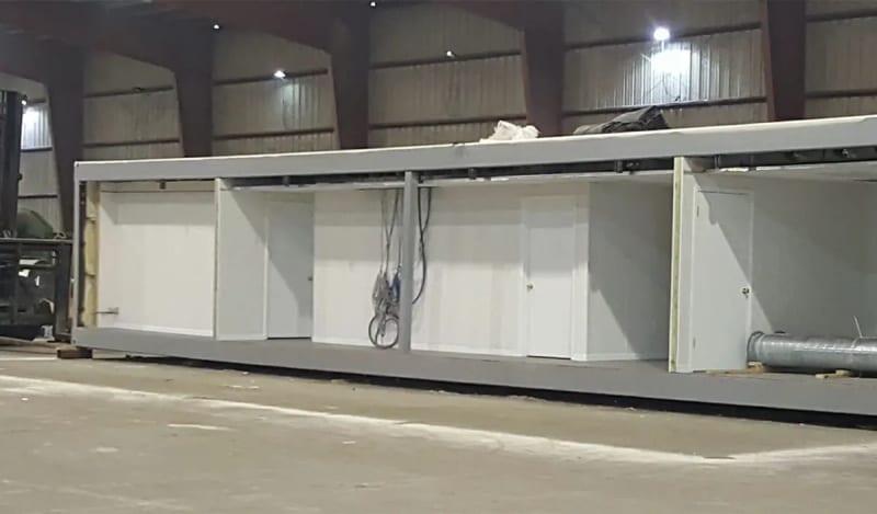 The interior of a module building with two rooms.