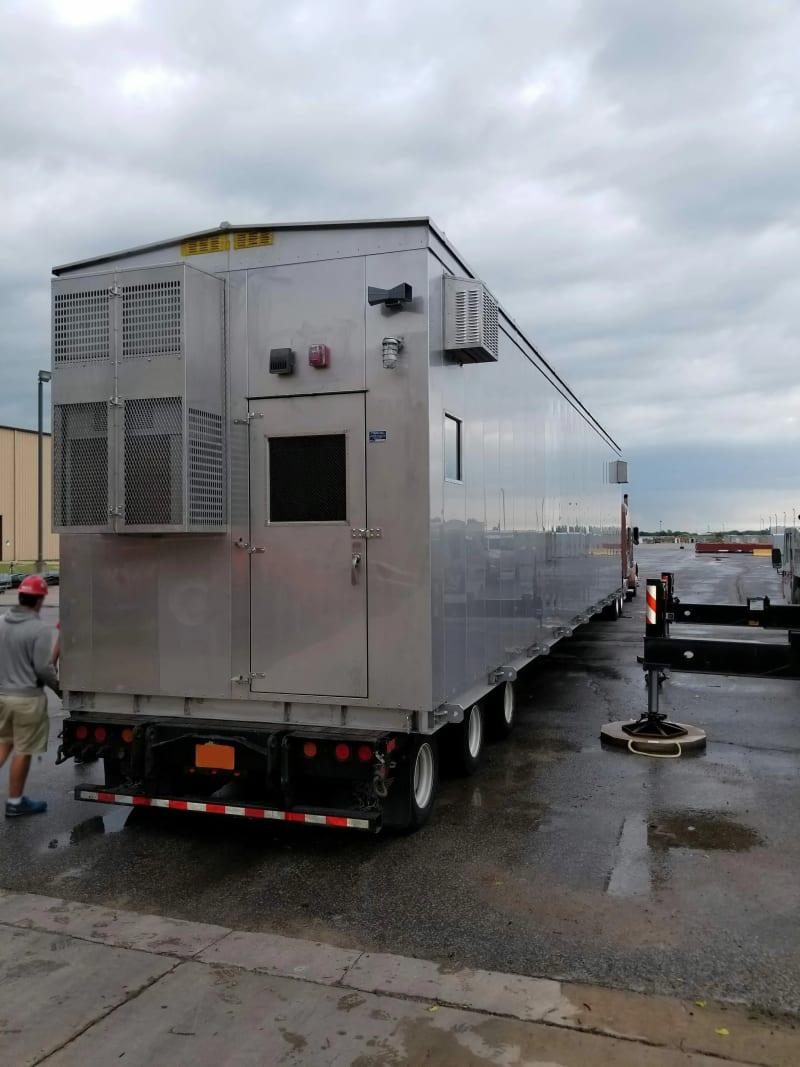 The back of a relay house on a truck