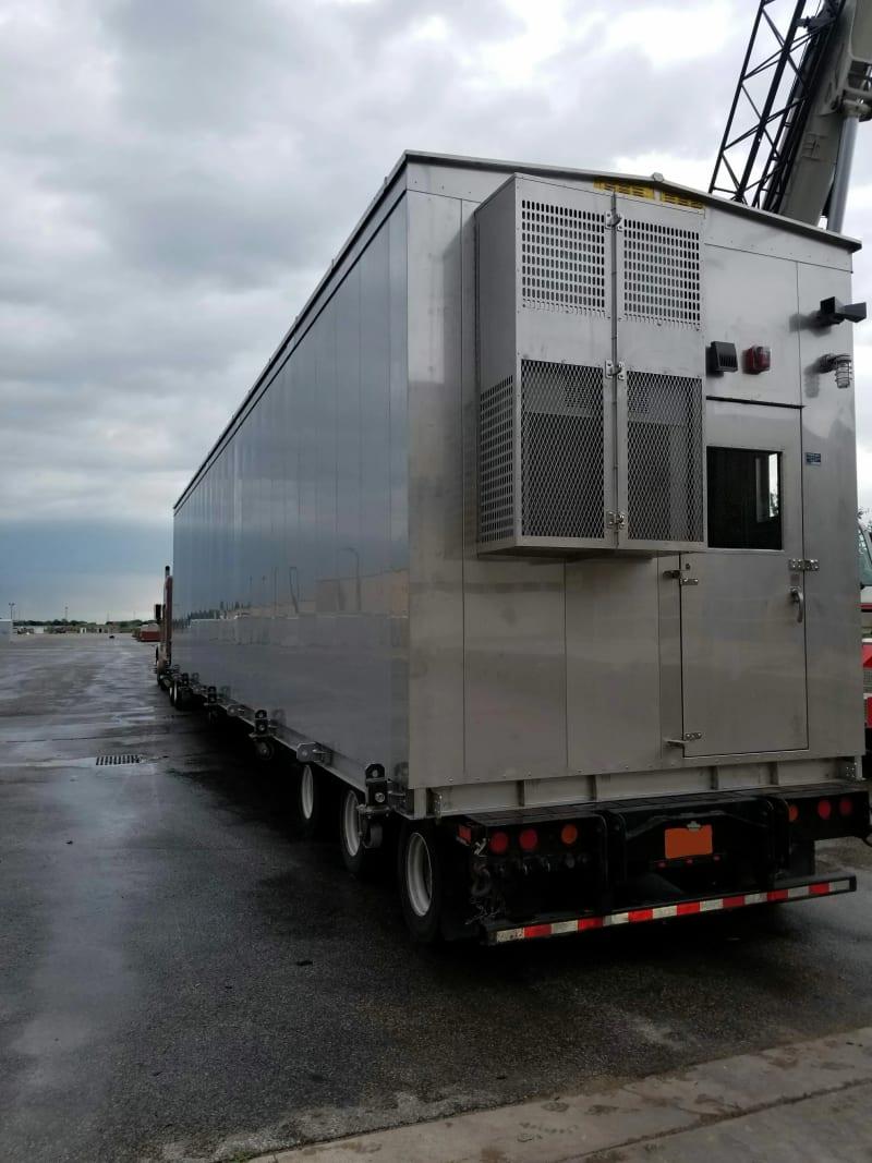 Another view of the back of a relay house on a truck