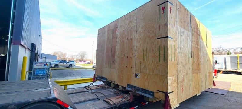 A large crate sitting outdoors