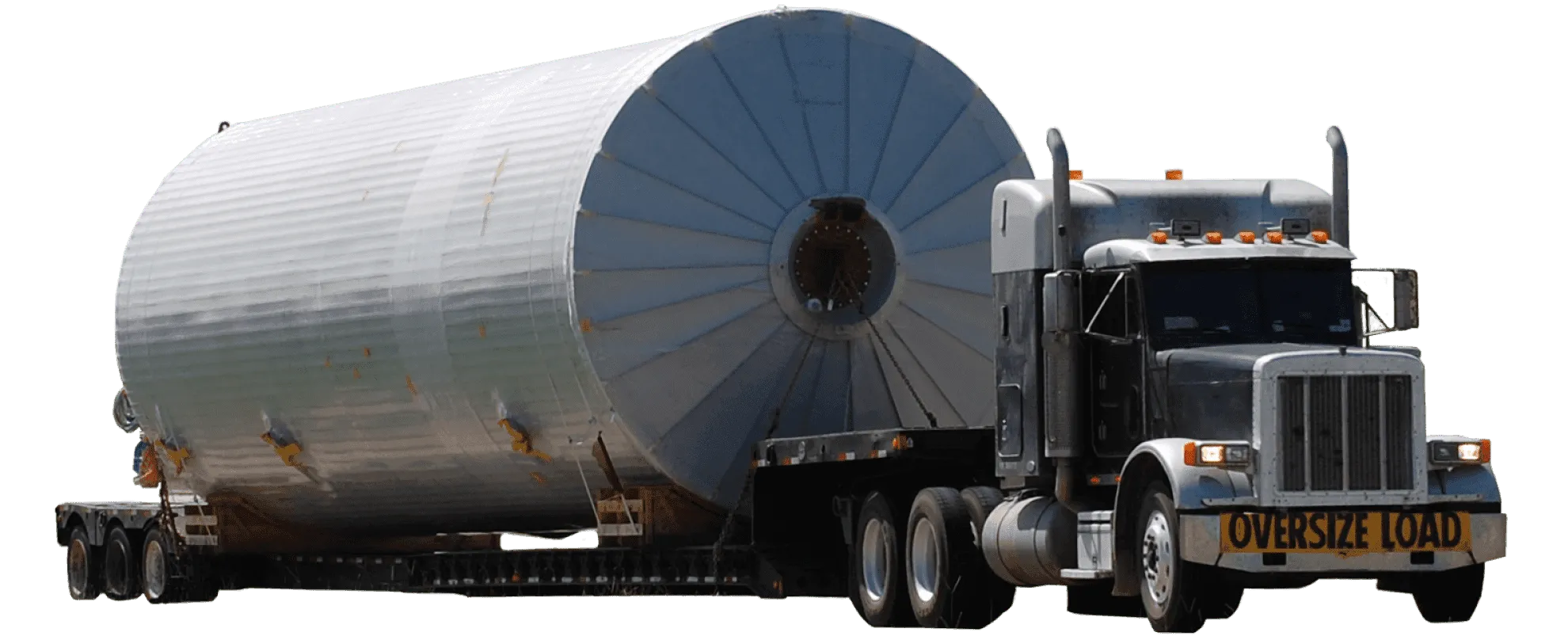 An overdimensional freight truck carrying an extremely oversized load.